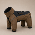 A dog winter coat designed in the shape of a horse, featuring a high collar and a dark navy blue back panel, shown on a neutral beige background.